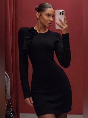 Victoria beckham black knit ruffle dress elegant minimalist designer piece